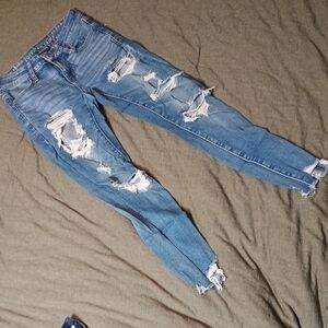 Women's Distressed Blue Jeans